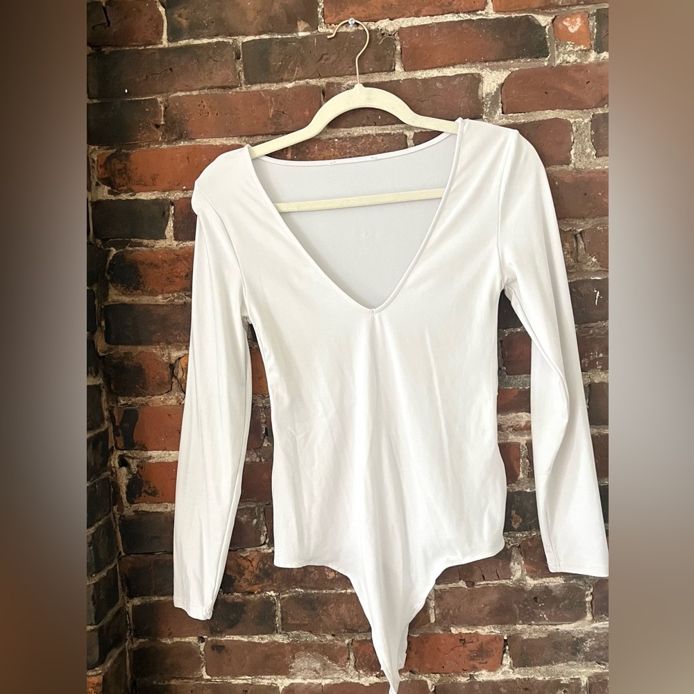 White long sleeved body suit